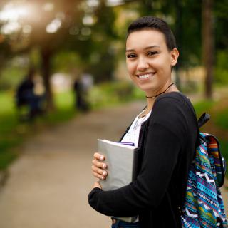 Woman holding books